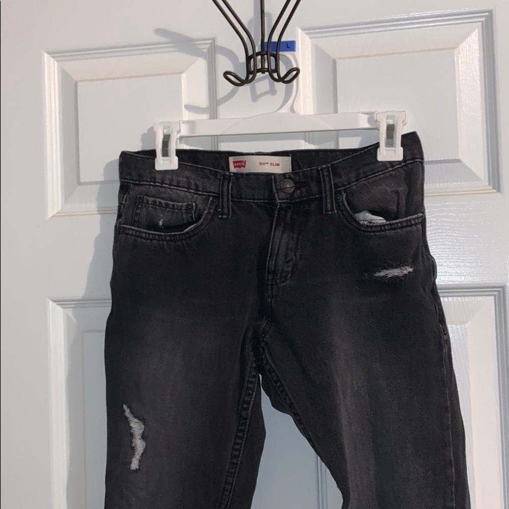 Levi’s black ripped jeans ( size 14 )